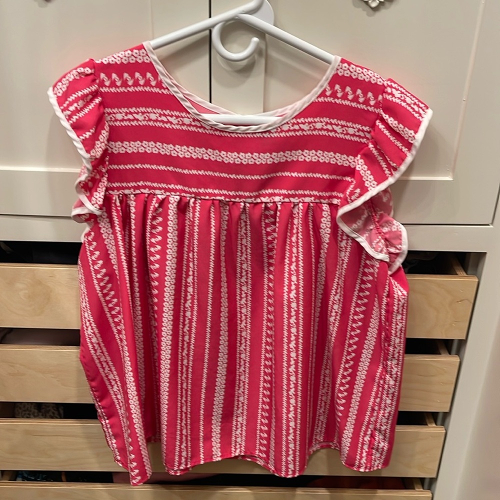 Silky and soft pink and white ruffle top